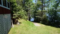 Cozy beachfront 2-bedroom cabin located on Little Saint Germain Lake Hotel a St. Germain
