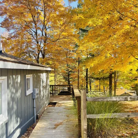 NEWLY RENOVATED! Large sandy beach & swim area. Cute 3 bedroom lake house