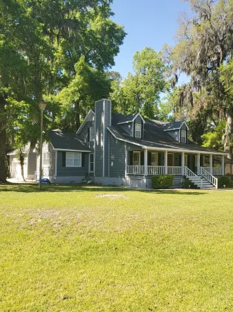 Large custom home with pool centrally located to beaches, parks, and family fun.