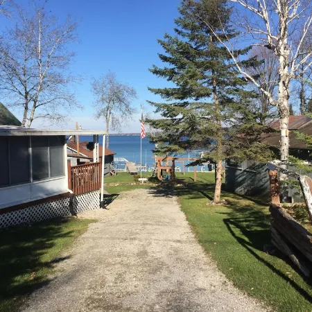 Vacation Stay at Hubbard Lake Air-Conditioned Lakefront Mobile Home