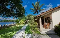 Cocotinos Manado Hotel dekat Wisata Susur Sungai & Mancing Desa Talawaan Bajo