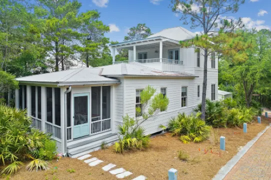 Magnolia Cottages by the Sea by PHG