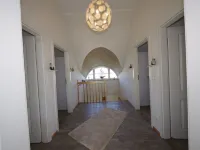 Albatros I - Exclusive thatched house on the waterfront Hotels in Ummanz