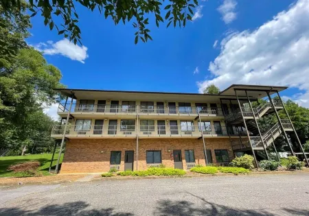 Hillside Lodge Отели в г. Пиджен