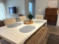 Pet friendly! King bed, smart TVs, mins to beaches from this brand new townhome
