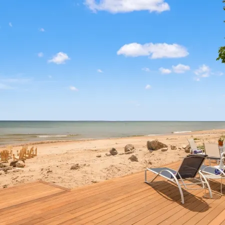 On The Rocks.  Lake Michigan Beachfront Home.