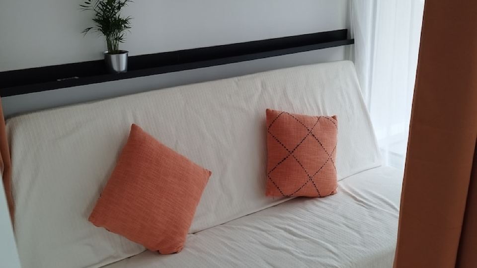 Completely renovated studio with sleeping area separated by partition and curtain