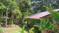 Private forest view cabin w/AC, 2 beds-restaurant and car rental on site.