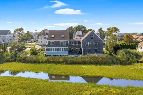 FULLY RENOVATED apt w/water views and deck near beach& marina