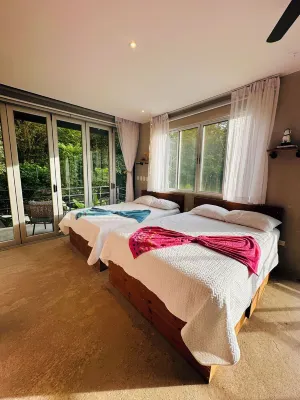 Charming 2-bedroom villa in wonderful Punta Leona with rooftop & patio. Pool