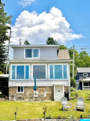 Spacious lakefront home with private dock and a panoramic view of Conneaut Lake.