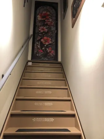 Large Private Fenced Yard with Guest Patio, Fire Pit and Surrounding Gardens.