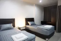 Area 15 Hotel & Apartment Hôtels à : Ongkharak