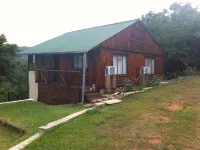 Tsanana Log Cabins and Mullberry Lane Suites Hotels near Beach Island, Graskop