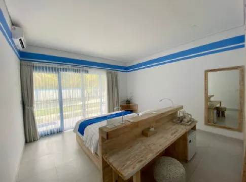 Kura Kura Divers Lodge Hoteles cerca de Jemeluk Beach