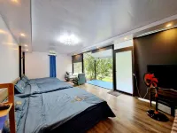 Homestay Vuon Trai Cay Nhiet Doi VO UU Garden Hotel di B Lá