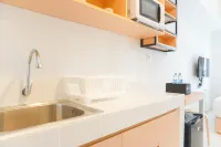 Comfort Studio (No Kitchen) Tokyo Riverside PIK 2 Apartment By Travelio Hotels in Kosambi
