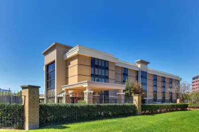 Heritage Inn Suites Houston Sugar Land, Trademark by Wyndham Hotels near LensCrafters