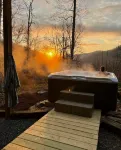 Whispering Falls Cabin - hot tub, views, 15 acres, minutes from Main St.