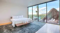 Cliffside Camelback Estate with Waterfall Pool, Bar and Epic Views