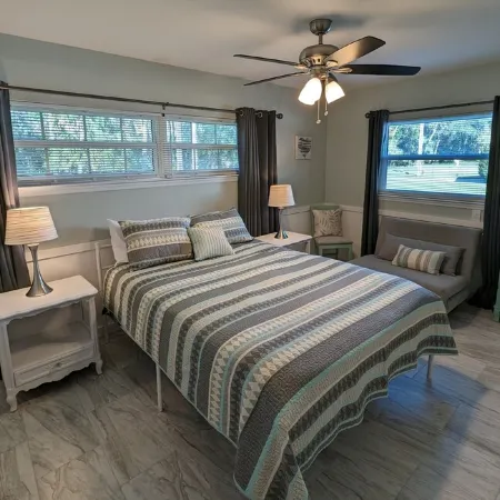 Waterfront Paradise w dock, large patio, lanai, pool, hot tub! Bring your boat!