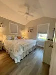 Cozy riverfront cottage with an easy beach-inspired coastal MI vibe!