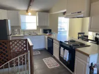 Waterfront 2 bedroom condo with pool, boat ramp and slips