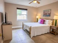 Private 4 bedroom house near the beach with pool, hot tub, fire pit, game room.
