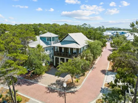 Walk or Bike to Everything! Private Beach Access! Resort Style Pool and Cafe!