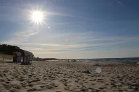 Close to the beach kinderfr. Apartment with balcony+terrace,sauna,wallbox, and washing machine