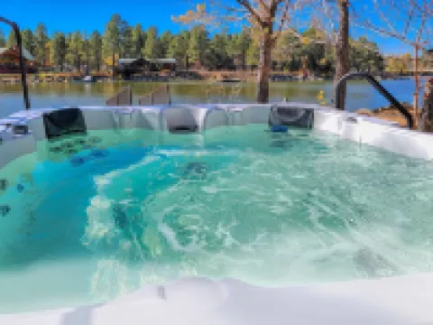 Luxury Waterfront Cabin at Rainbow Lake w/Private Dock, Hot Tub, AC & Game Room