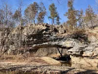 Line Camp Cabin is Secluded in The Woods Near The River.