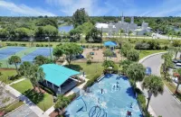 Luxurious modern home w/ private tropical backyard close to beach and downtown!