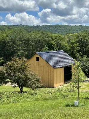 Restored historic farmhouse on 25 private acres