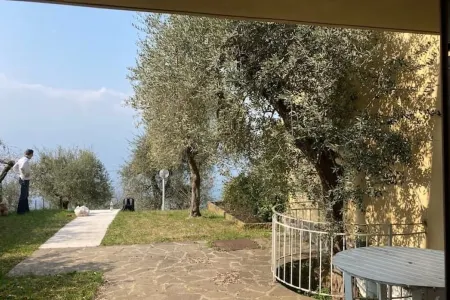 Lake view apartment with large hydromassage tub directly in the bedroom.