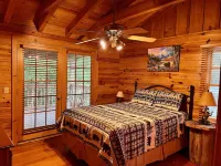 Riverfront Log Cabin with Hot Tub-Tubing on the River, Pet Friendly.