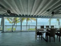 Oceanfront Gated Corner lot Amazing Sunsets. 90” BoatDock & 12 person Swim Spa!