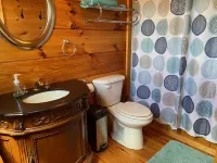 Tiny, charming mountaintop cottage with large firepit, deck and amazing views