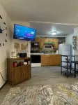 "Prime Location Stylish 1Bedroom  with Hot Tub Access, across street from Legion