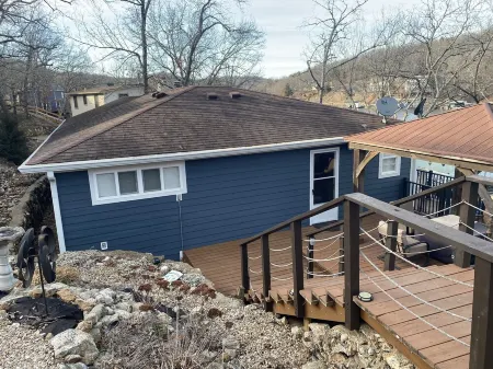 Single level home in a gentle, quiet , deep water cove  at Lake of the Ozarks .