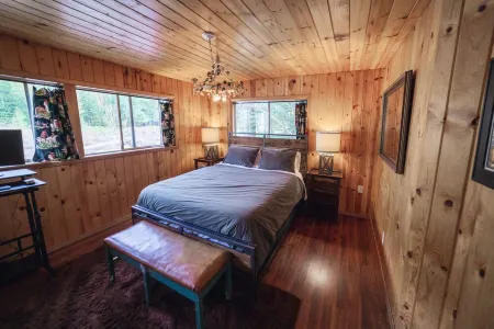 Riverside Mid-Century Cabin with Mountain Views