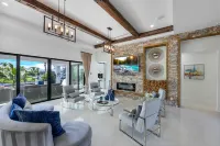 New Gorgeous Smart Home with Heated Pool on the Canal Hotels in Cape Coral