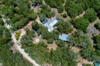 Tree Lined Retreat with Outdoor Lounge and Fire Pit - Charming Getaway