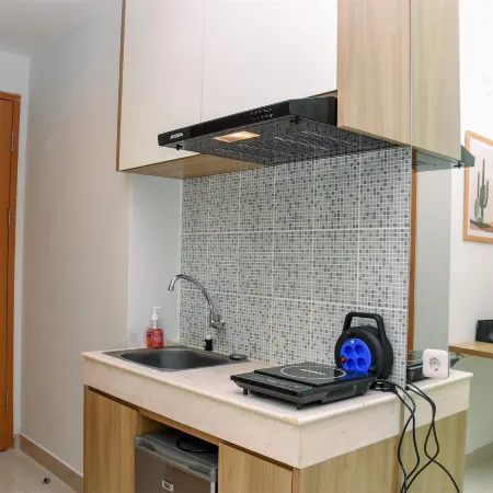 Comfy Studio Room at Evenciio Margonda Apartment