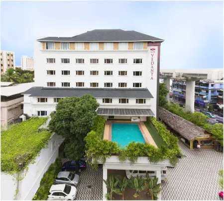 The PGS Vedanta Отели рядом с достопримечательностью «Керала Хай Корт»