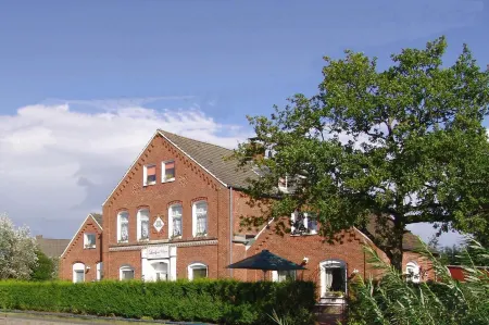 Hotel Garni Landhaus Uttum Отели в г. Крумхёрн