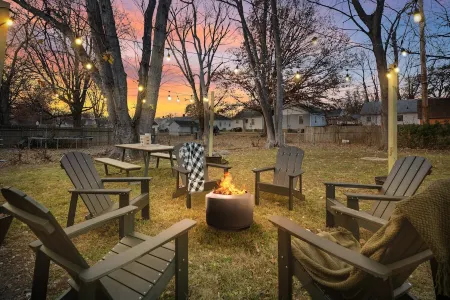 Urban Oasis: A Charming Downtown Retreat with Game Room, Firepit and Yard Games