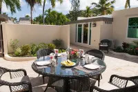 Beautifully newly renovated 3 BR/4 BA condo footsteps from the beach.