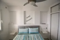 Modern garden apartment with a fantastic view of the sea and a private garden