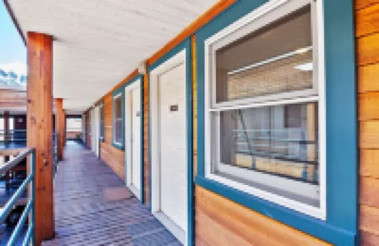 Top Floor Condo with Balcony Steps to Lifts & Main Street 2 Bedroom Condo by RedAwning